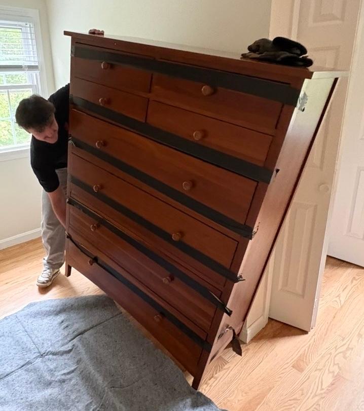 Furniture removal โ dresser removal in progress